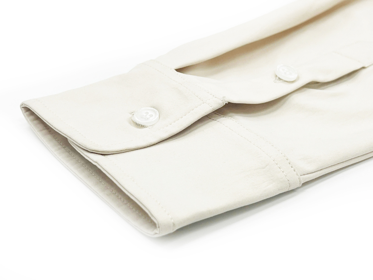 The cuff features two buttons, allowing for adjustable fit and comfort across different wrist sizes.