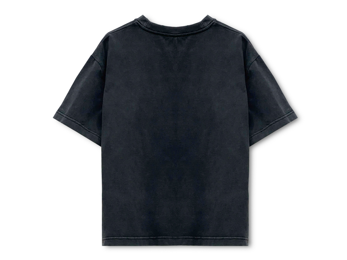 The back of this oversized black T-shirt is designed with a minimalistic approach, featuring a solid washed fabric with no additional prints or embellishments.