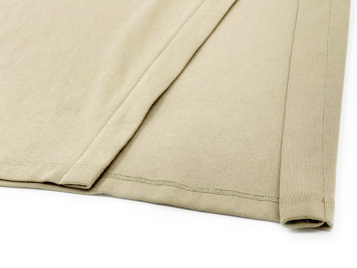 The side slit is thoughtfully designed to provide ease of movement while maintaining a sophisticated silhouette.