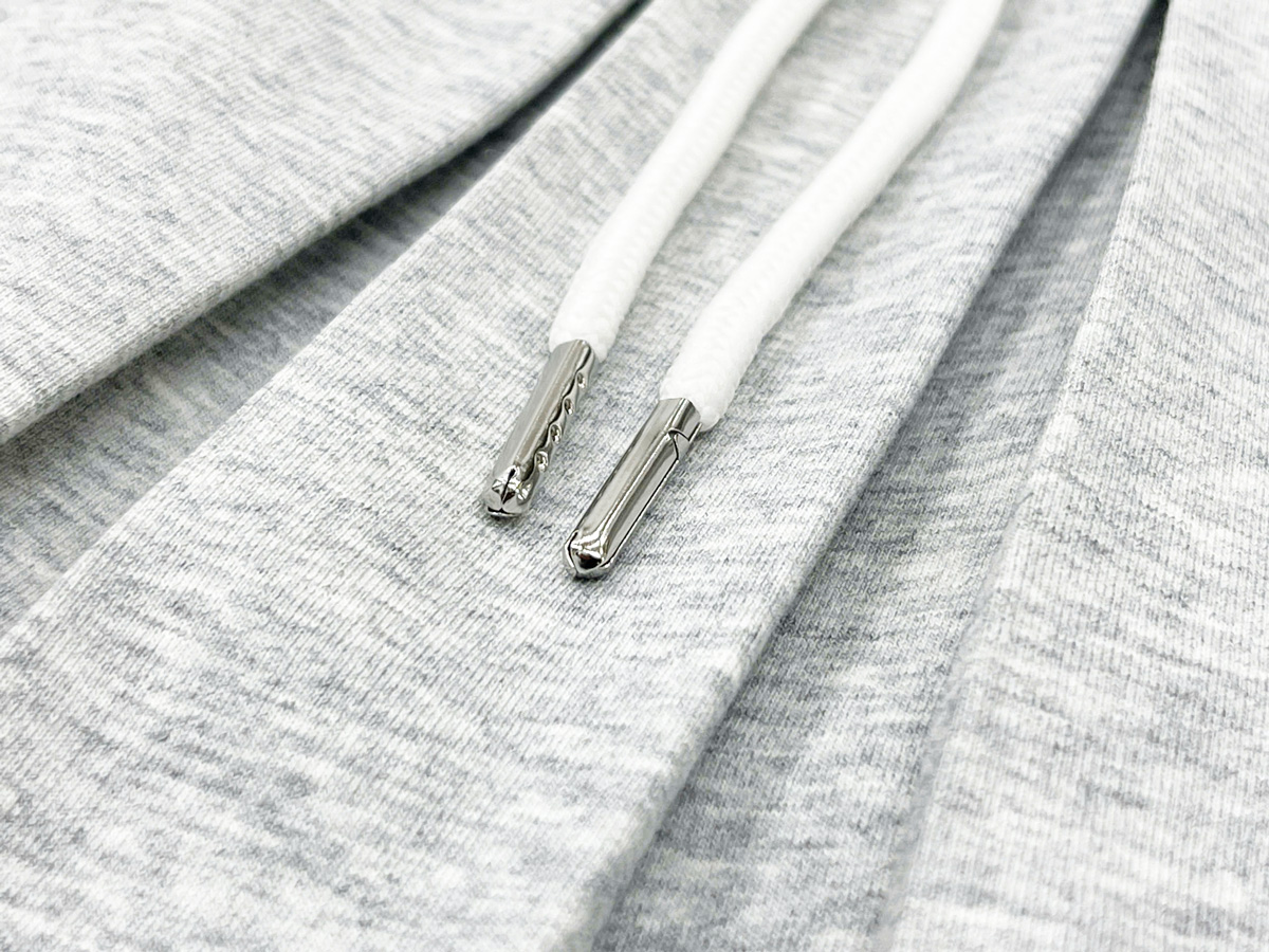 The drawstring is designed for durability and easy adjustability, allowing the wearer to customize the tightness of the waistband as needed.