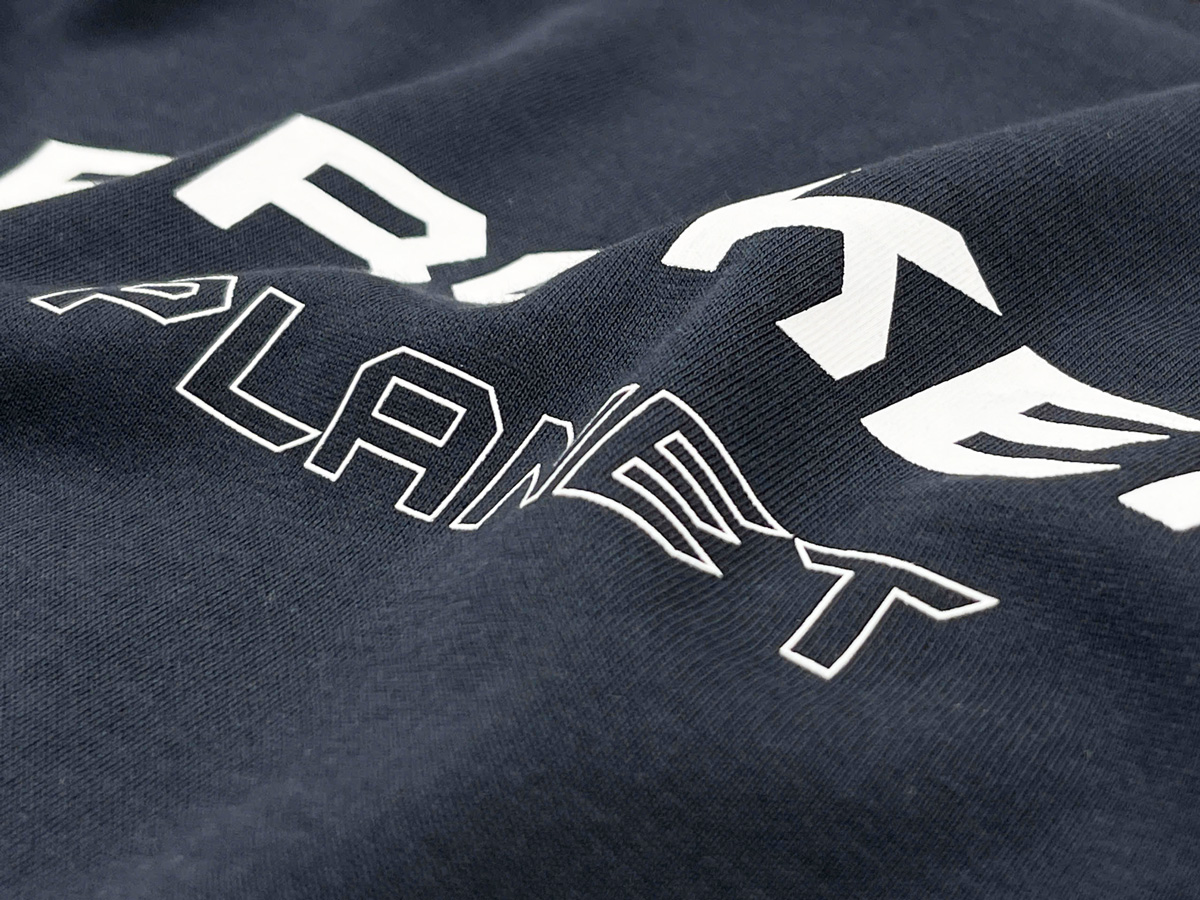 The shirt features rubber printing technology, ensuring high adhesion, sharp details, and a slightly raised surface for an eye-catching 3D effect. 