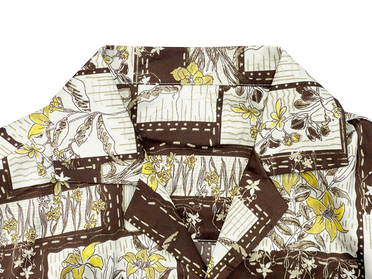 Features a laid-back Cuban collar that channels vintage summer vibes—relaxed yet stylish.