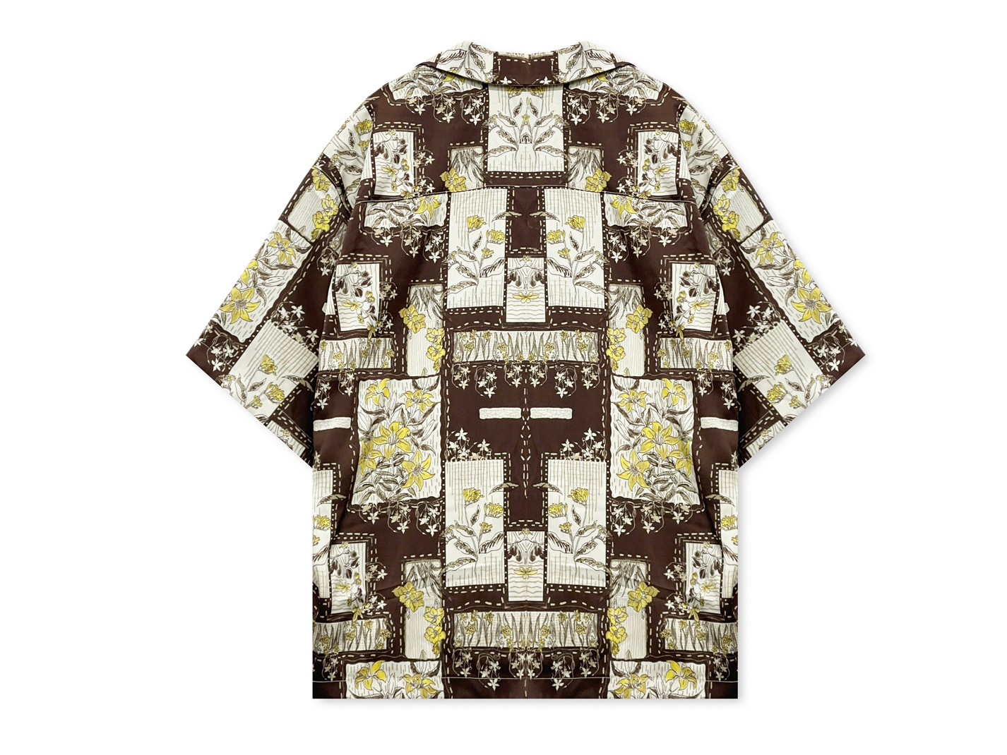 The botanical motif continues across the back in a balanced, symmetrical layout that feels like a hand-crafted artwork.