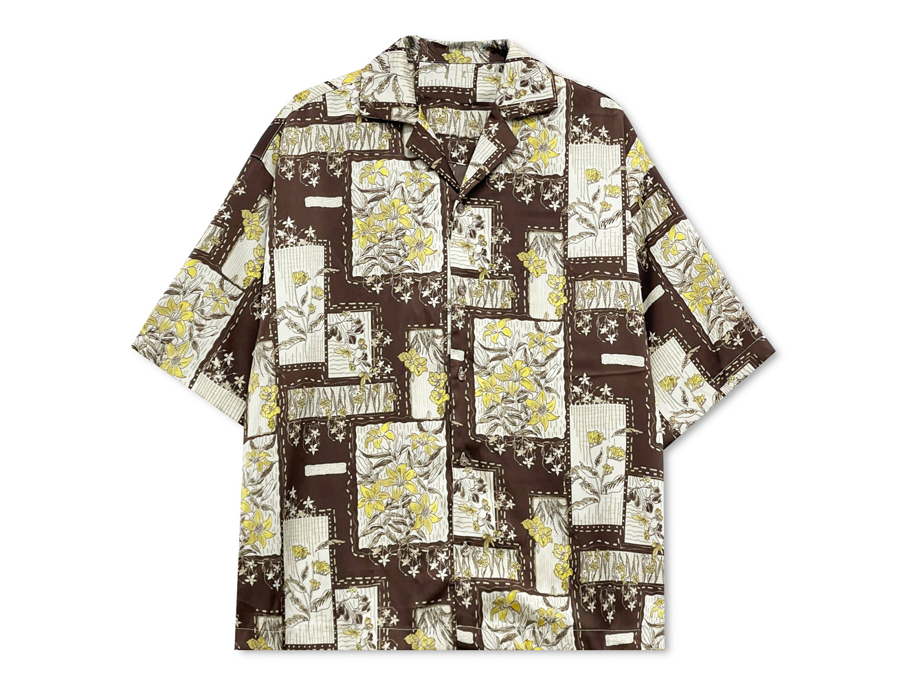 With a loose fit and open collar, it’s your perfect companion for effortless summer days.